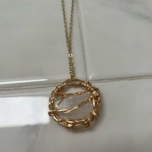 Crystal pendant in gold chain